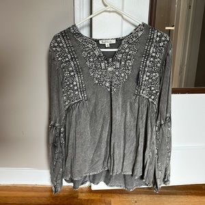 Gray distressed women’s blouse